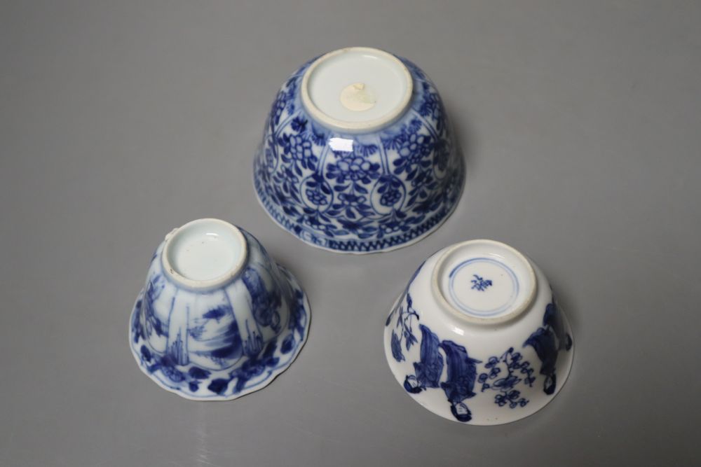 Three Chinese Kangxi blue and white tea bowls and saucers, largest 14cm (6)